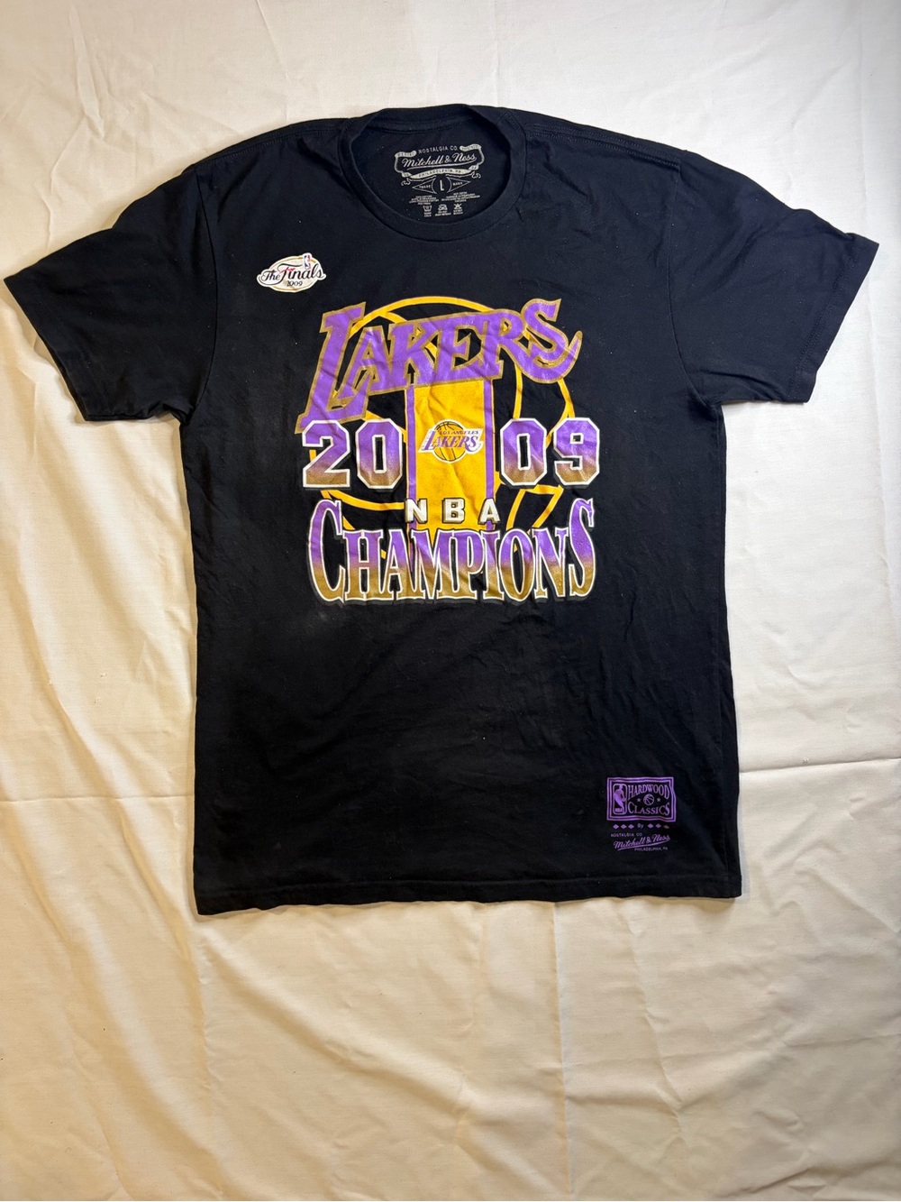 Mitchell & Ness Black T-Shirt with Purple Hardwood Classics Logo